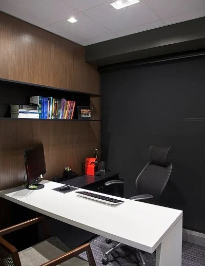 Interior do escritório Andrade & Flores, sala de atendimento